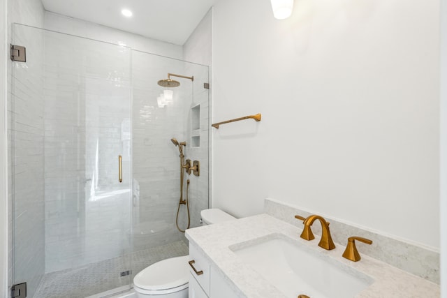 2790 Burden Creek Rd, Johns Island, SC 29455 - bathroom featuring toilet, vanity, a shower stall, and recessed lighting