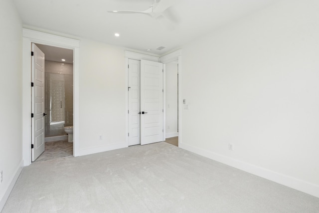 2790 Burden Creek Rd, Johns Island, SC 29455 - unfurnished bedroom with carpet flooring, recessed lighting, baseboards, connected bathroom, and a closet
