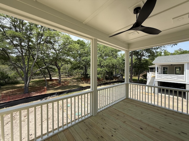 2790 Burden Creek Rd, Johns Island, SC 29455 - wooden deck featuring a ceiling fan, view of scattered trees, and stairway