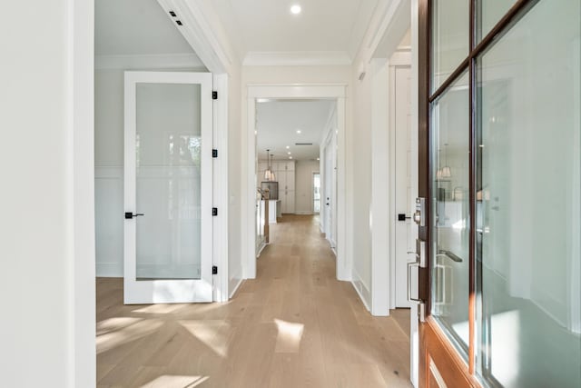 2790 Burden Creek Rd, Johns Island, SC 29455 - hallway featuring light wood-style floors, crown molding, baseboards, recessed lighting, and french doors