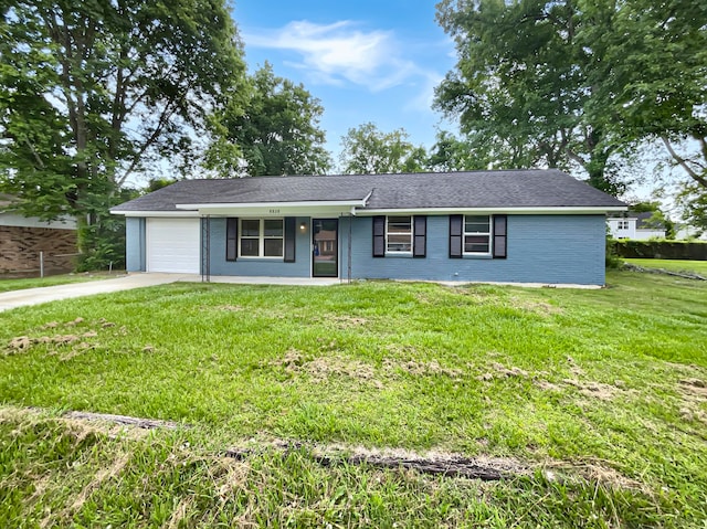 ranch-style house featuring a porch, a garage, and a front lawn