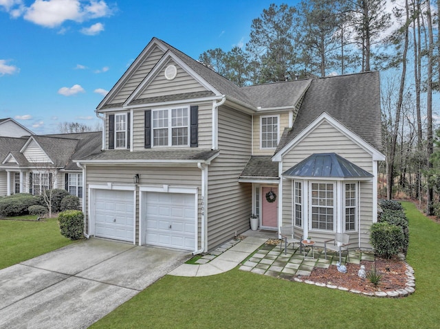 traditional-style home featuring a garage, concrete driveway, roof with shingles, and a front lawn