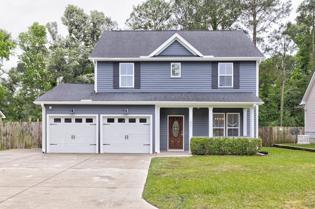 321 Houston Dr, Ladson, SC 29456 - traditional-style house featuring driveway, a porch, and a shingled roof