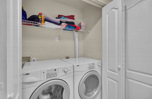 laundry area featuring independent washer and dryer