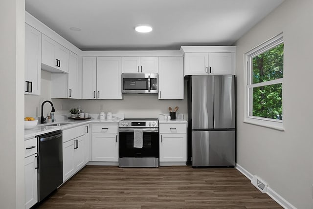 105 Brailsford Rd, Summerville, SC 29485 - kitchen featuring white cabinets, a sink, visible vents, light countertops, and appliances with stainless steel finishes