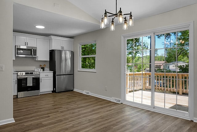 105 Brailsford Rd, Summerville, SC 29485 - kitchen with baseboards, appliances with stainless steel finishes, dark wood-type flooring, and white cabinetry