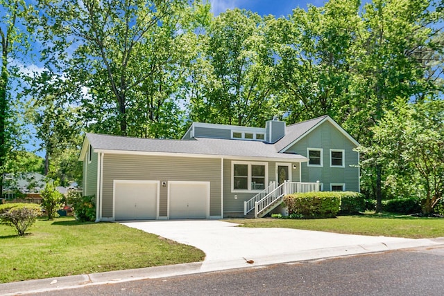 105 Brailsford Rd, Summerville, SC 29485 - view of front of home with concrete driveway, a front lawn, a shingled roof, and a garage