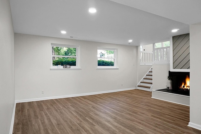 105 Brailsford Rd, Summerville, SC 29485 - basement with baseboards, wood finished floors, a wealth of natural light, and stairway