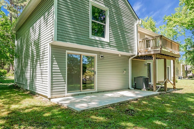 105 Brailsford Rd, Summerville, SC 29485 - rear view of house with central AC unit, a wooden deck, a yard, and a patio