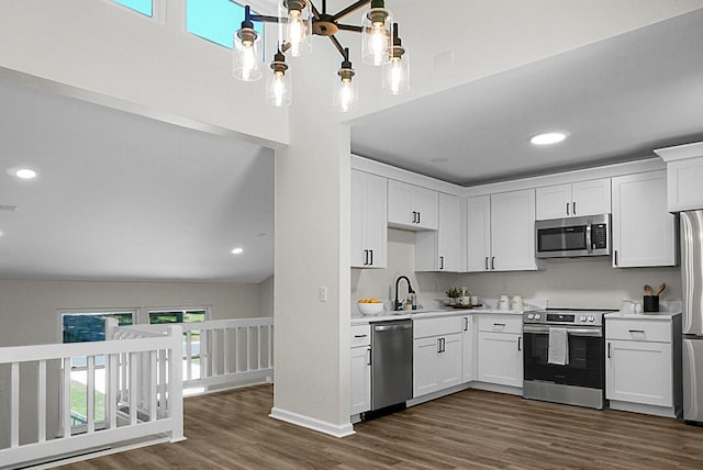 105 Brailsford Rd, Summerville, SC 29485 - kitchen with white cabinets, dark wood-style floors, a sink, light countertops, and appliances with stainless steel finishes
