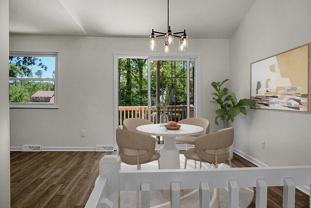 105 Brailsford Rd, Summerville, SC 29485 - dining space with wood finished floors, a wealth of natural light, baseboards, and an inviting chandelier