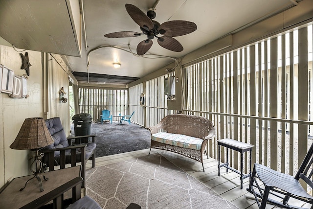 sunroom / solarium with ceiling fan