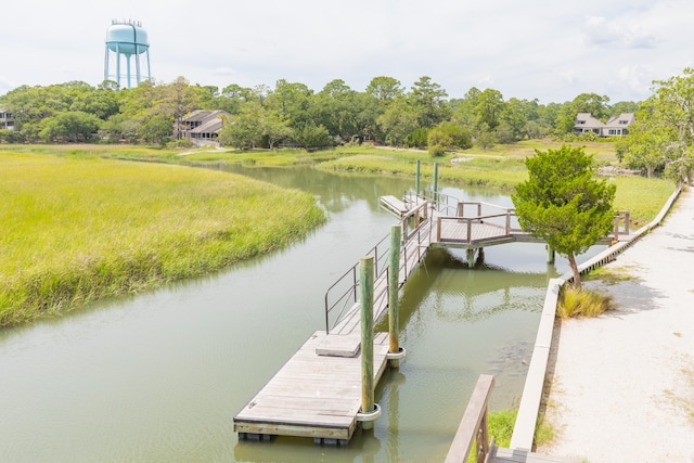 dock area with a water view