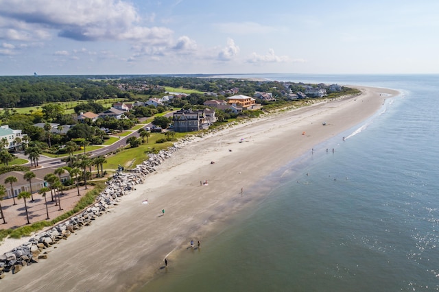 bird's eye view with a water view and a view of the beach