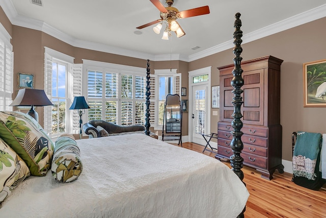 bedroom with ceiling fan, ornamental molding, and light hardwood / wood-style flooring