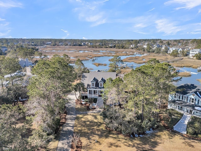 drone / aerial view with a water view