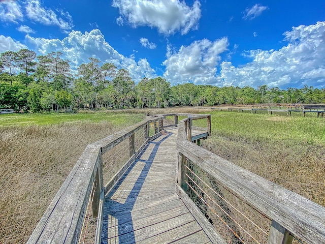 view of dock featuring a rural view