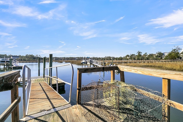 view of dock with a water view