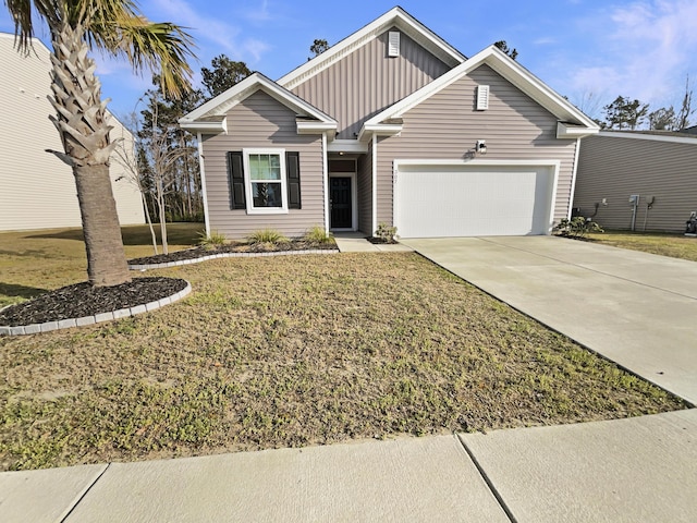 view of front of home with board and batten siding, a front yard, driveway, and a garage