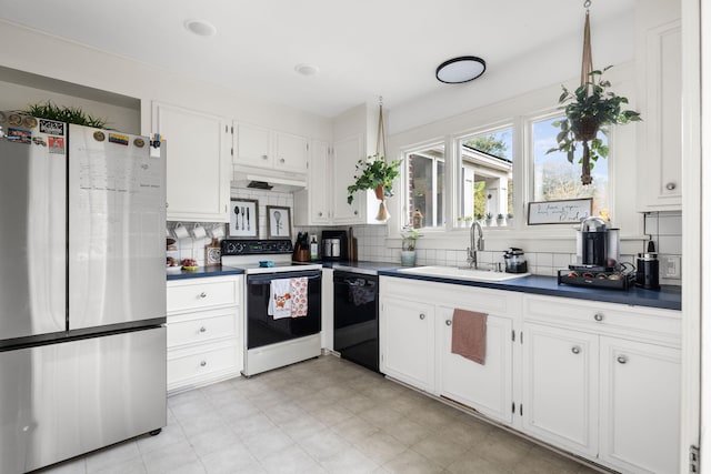 kitchen with white cabinets, stainless steel fridge, sink, dishwasher, and electric range