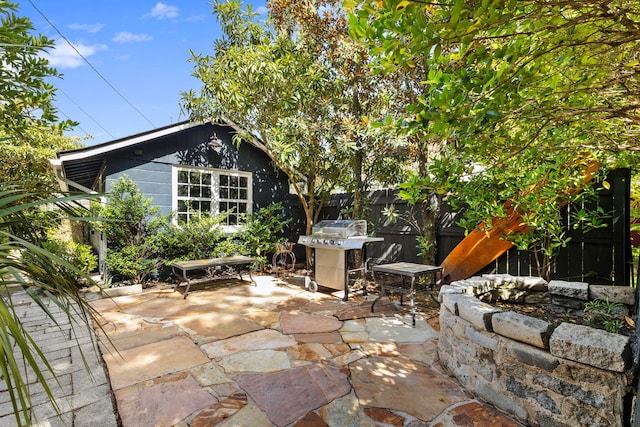 view of patio with a grill