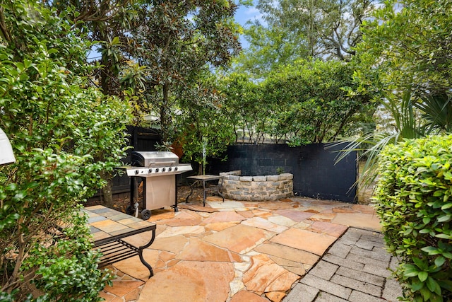 view of patio with a grill