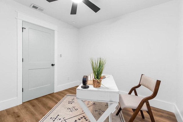 office featuring ceiling fan and hardwood / wood-style floors