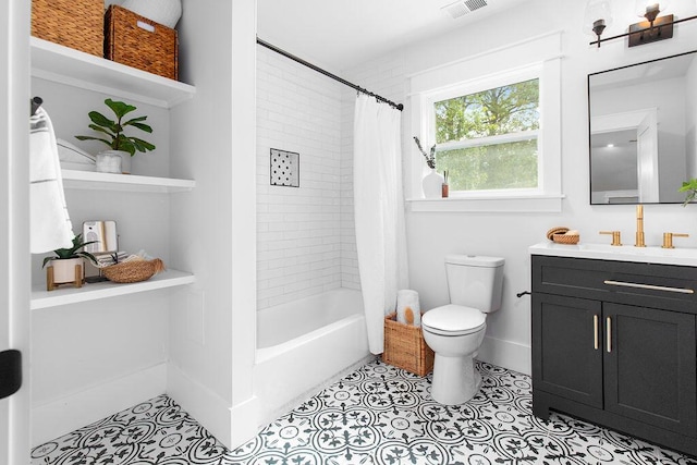 full bathroom with tile patterned flooring, vanity, shower / bath combination with curtain, and toilet