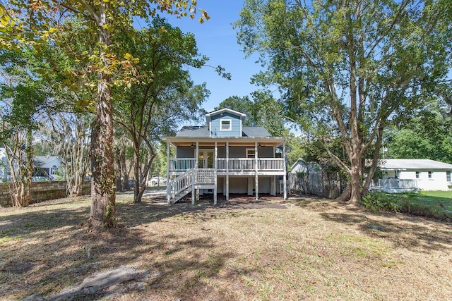 view of front of property featuring covered porch