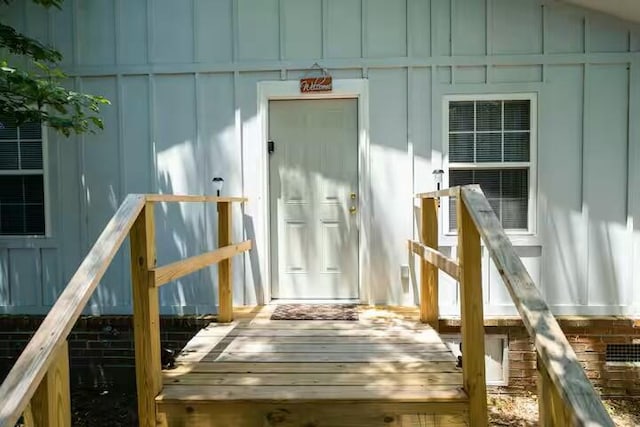 property entrance with board and batten siding