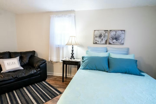 bedroom featuring wood finished floors