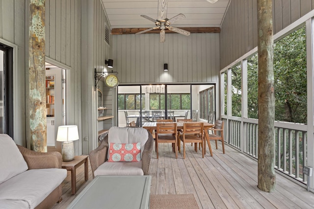 sunroom / solarium with ceiling fan