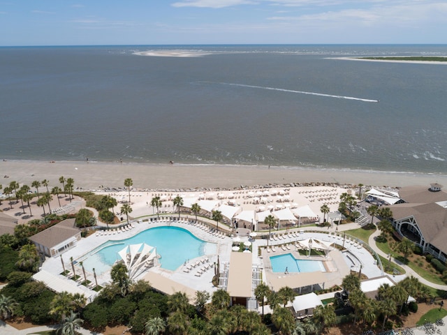 bird's eye view with a water view and a view of the beach