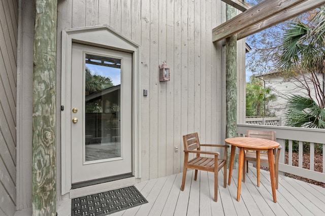 doorway to property with a deck