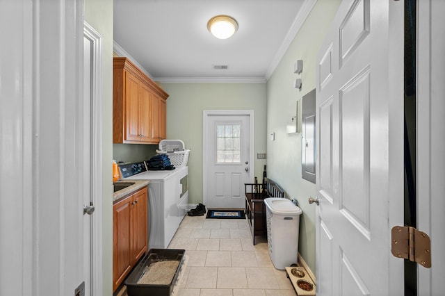 laundry room with cabinet space, visible vents, ornamental molding, light tile patterned flooring, and washer and dryer