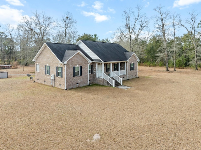 single story home with brick siding, crawl space, a porch, and a shingled roof