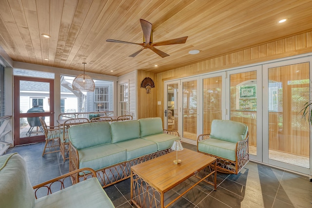 304 Bank St, Mount Pleasant, SC 29464 - living area featuring wooden ceiling, ceiling fan, wood walls, recessed lighting, and dark tile patterned flooring