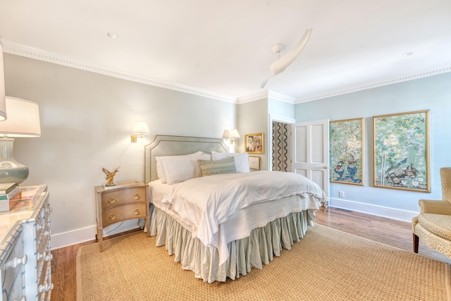 304 Bank St, Mount Pleasant, SC 29464 - bedroom featuring light wood finished floors, crown molding, and baseboards