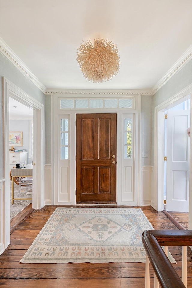 304 Bank St, Mount Pleasant, SC 29464 - foyer entrance with a decorative wall, hardwood / wood-style flooring, ornamental molding, plenty of natural light, and a wainscoted wall