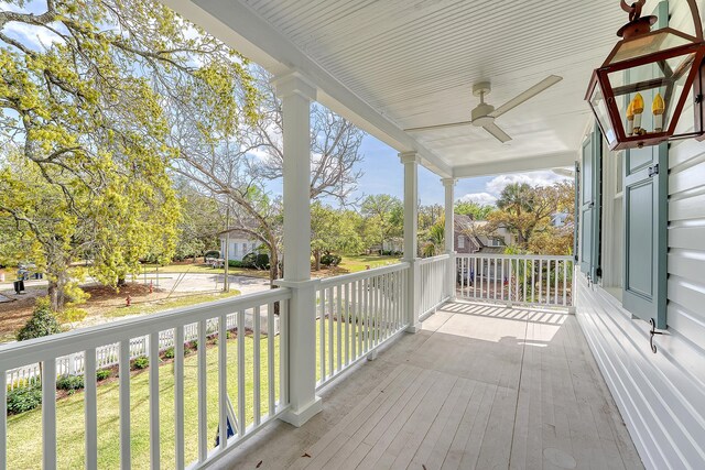 304 Bank St, Mount Pleasant, SC 29464 - wooden porch with a lawn and ceiling fan