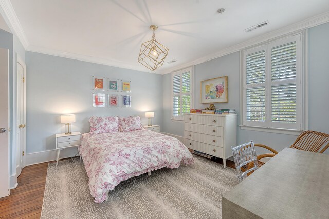 304 Bank St, Mount Pleasant, SC 29464 - bedroom featuring wood finished floors, baseboards, and ornamental molding