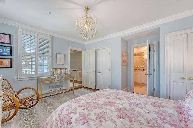304 Bank St, Mount Pleasant, SC 29464 - bedroom with ornamental molding, baseboards, a closet, and connected bathroom