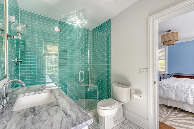 304 Bank St, Mount Pleasant, SC 29464 - ensuite bathroom featuring toilet, a stall shower, baseboards, and vanity