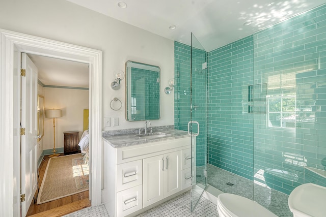 304 Bank St, Mount Pleasant, SC 29464 - ensuite bathroom with a shower stall, vanity, and toilet