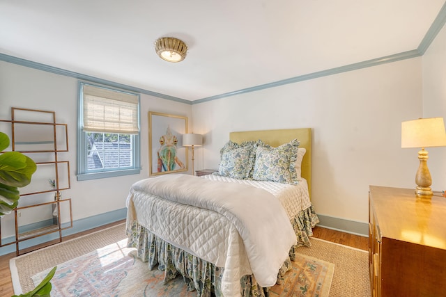 304 Bank St, Mount Pleasant, SC 29464 - bedroom featuring ornamental molding, wood finished floors, and baseboards