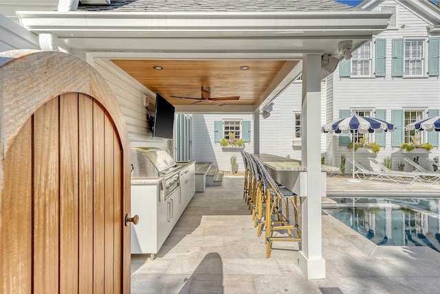 304 Bank St, Mount Pleasant, SC 29464 - view of patio featuring ceiling fan and an outdoor pool