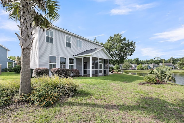 3310 Hartwell St, Johns Island, SC 29455 - rear view of property with a sunroom, a yard, and a water view