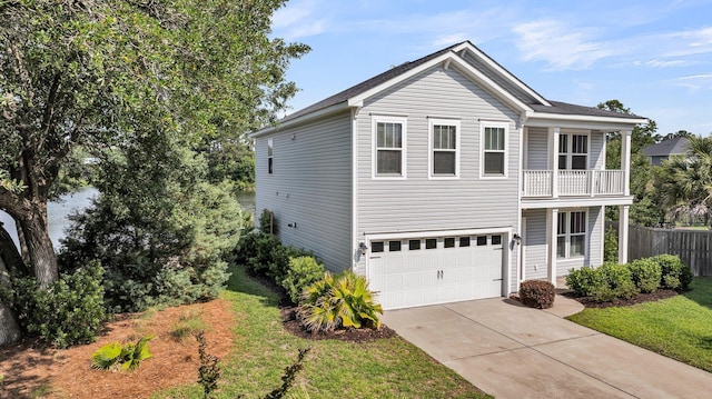 3310 Hartwell St, Johns Island, SC 29455 - view of front of property featuring a balcony, driveway, and a garage
