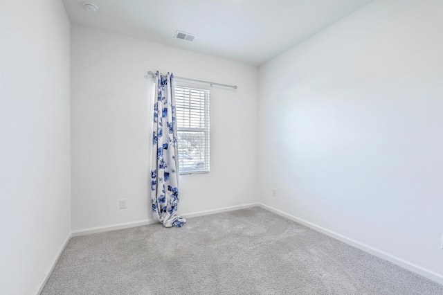 bedroom with light colored carpet