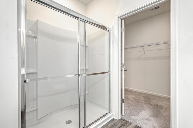 spacious closet featuring carpet floors